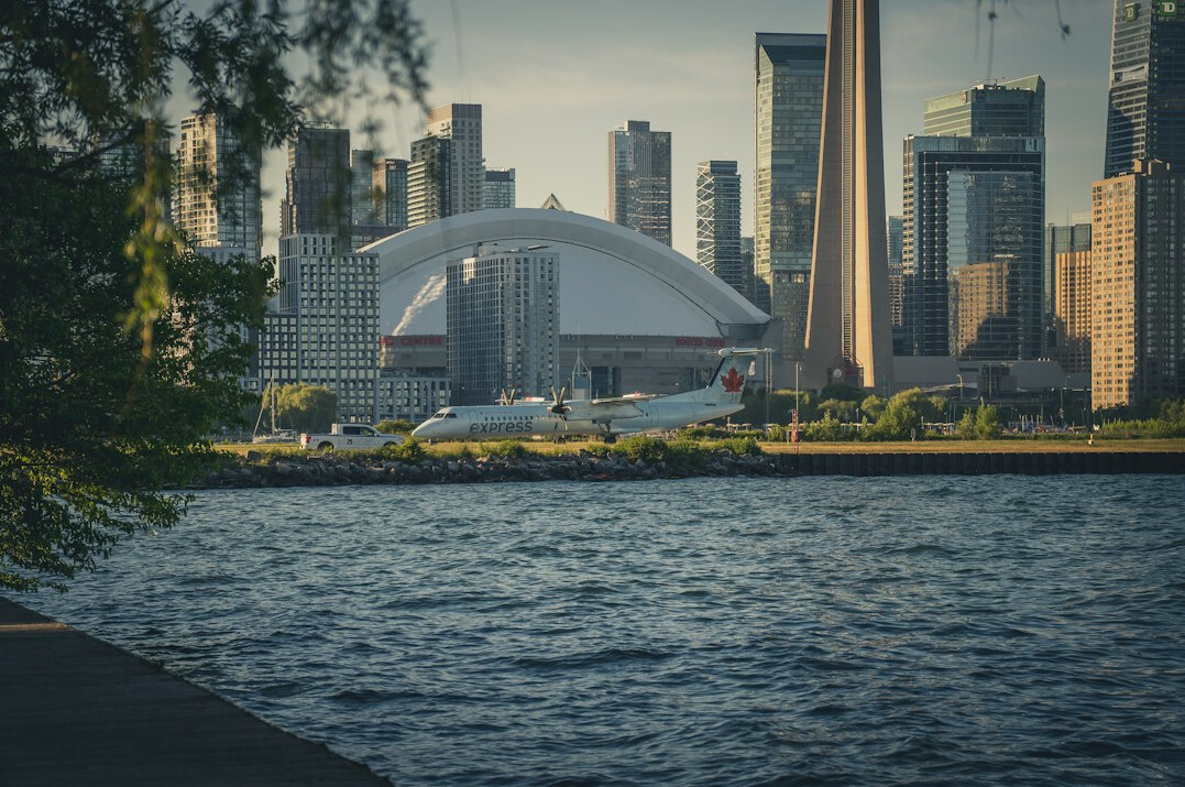 Toronto city skyline along the waterfront at dusk
